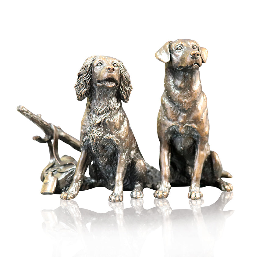 Working labrador springer spaniel sitting waiting bronze sculpture