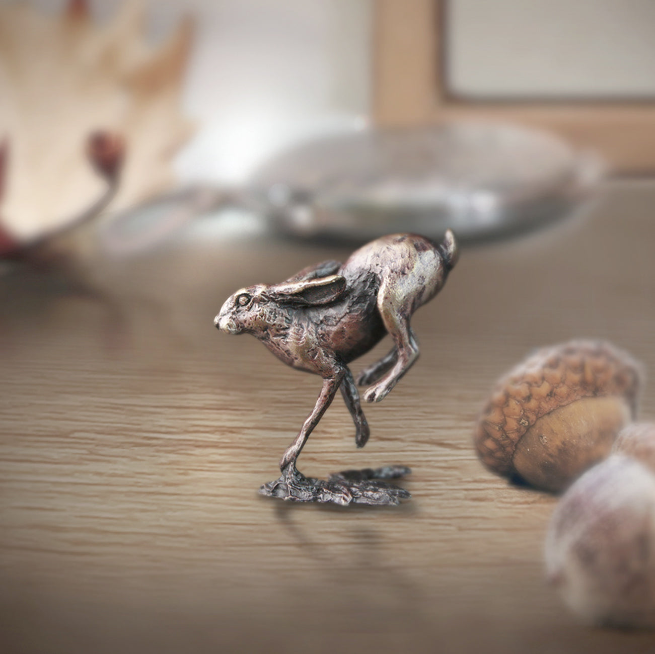 miniature bronze hare running gift sculpture butler and peach