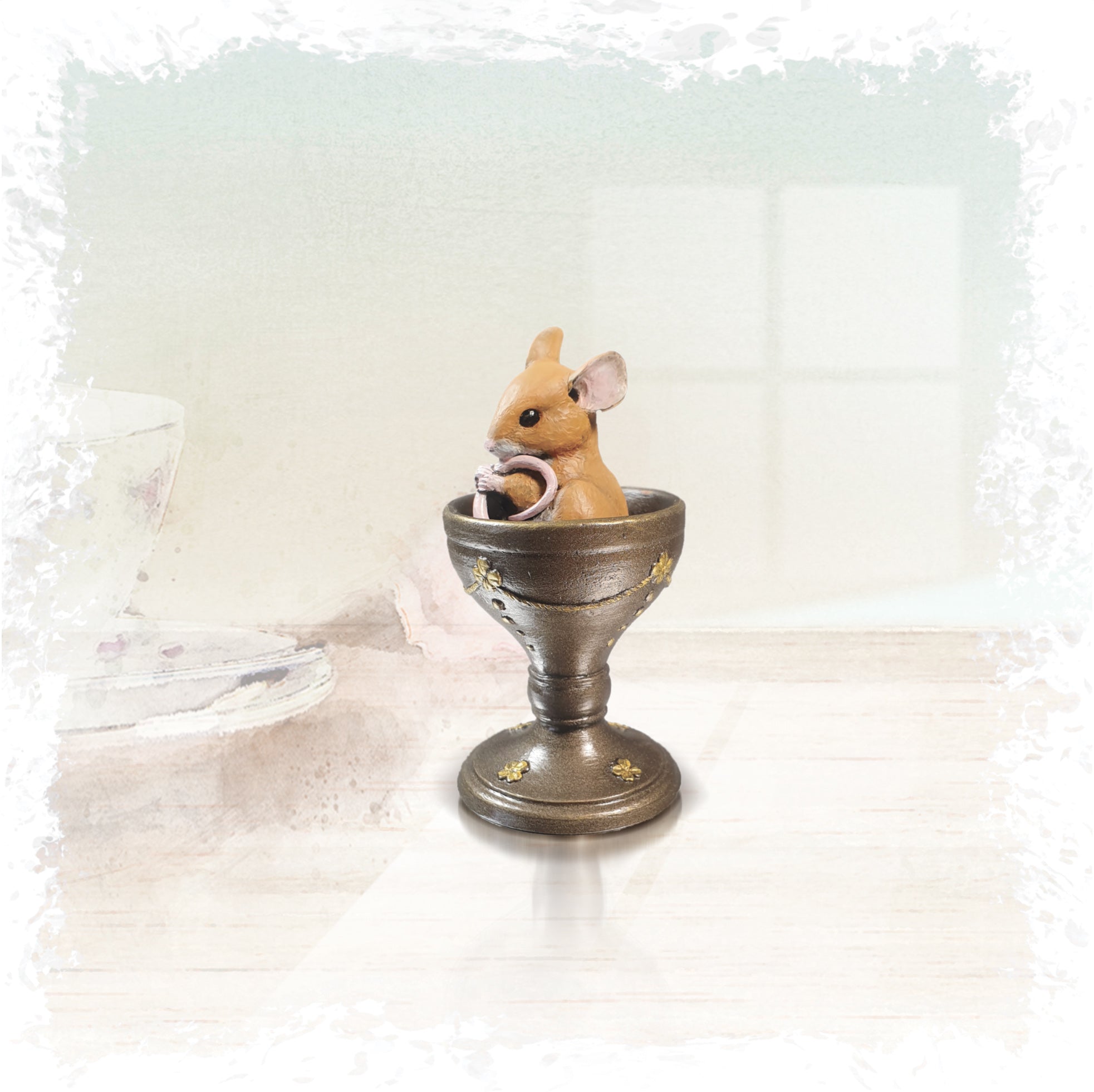 hand painted bronze mouse in egg cup sculpture