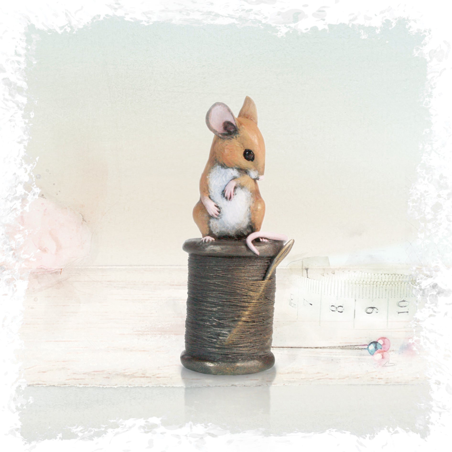 hand painted bronze mouse on cotton reel sculpture