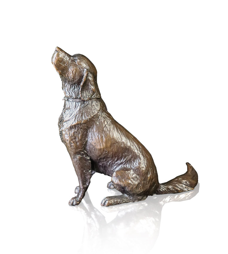 retriever dog sitting bronze sculpture