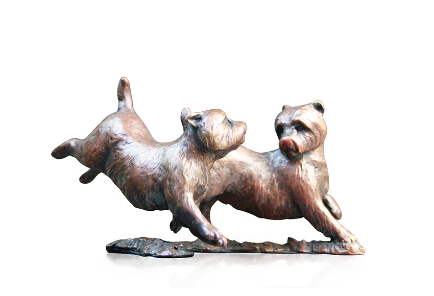 bronze sculpture pair of westies playing together