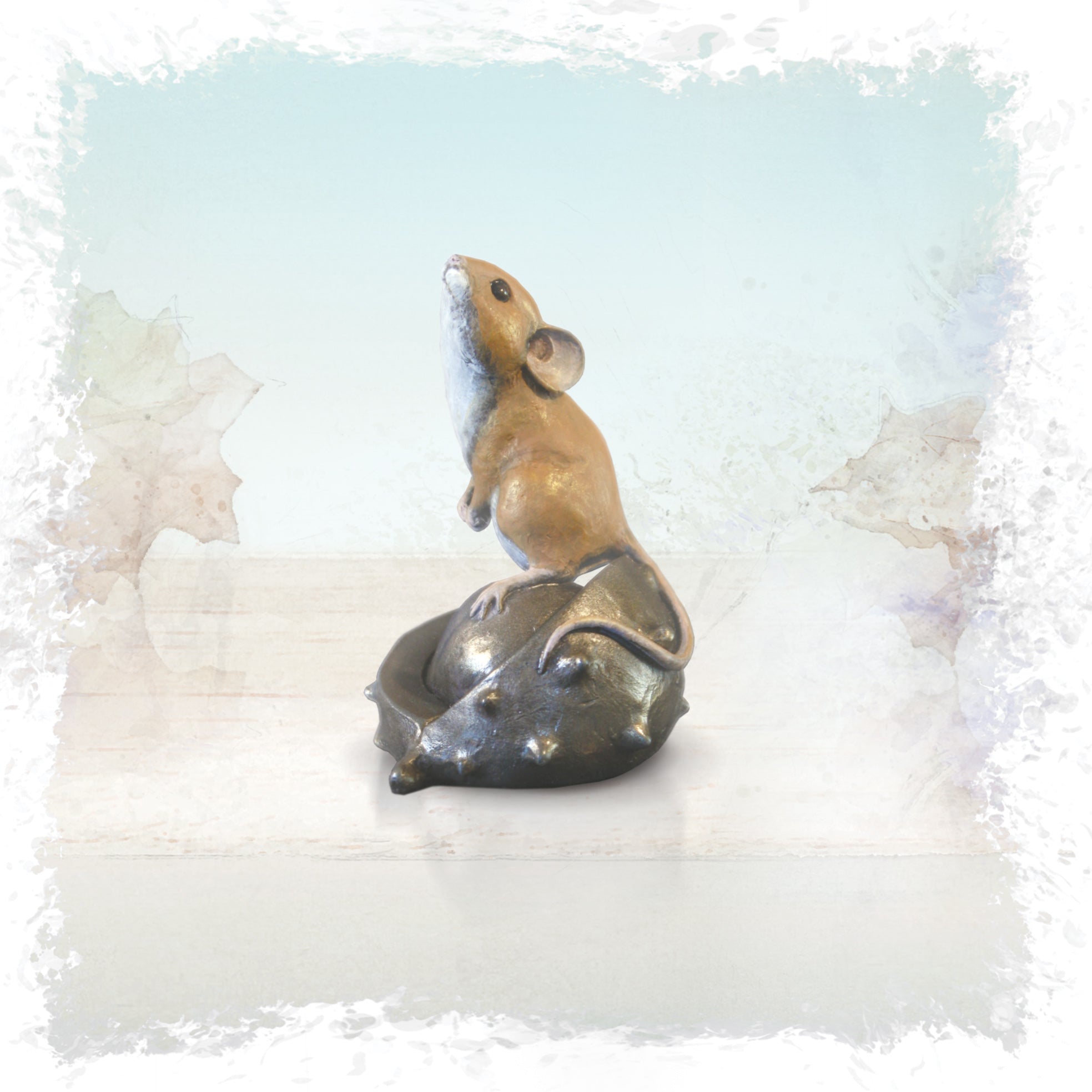 hand painted bronze mouse on conker sculpture